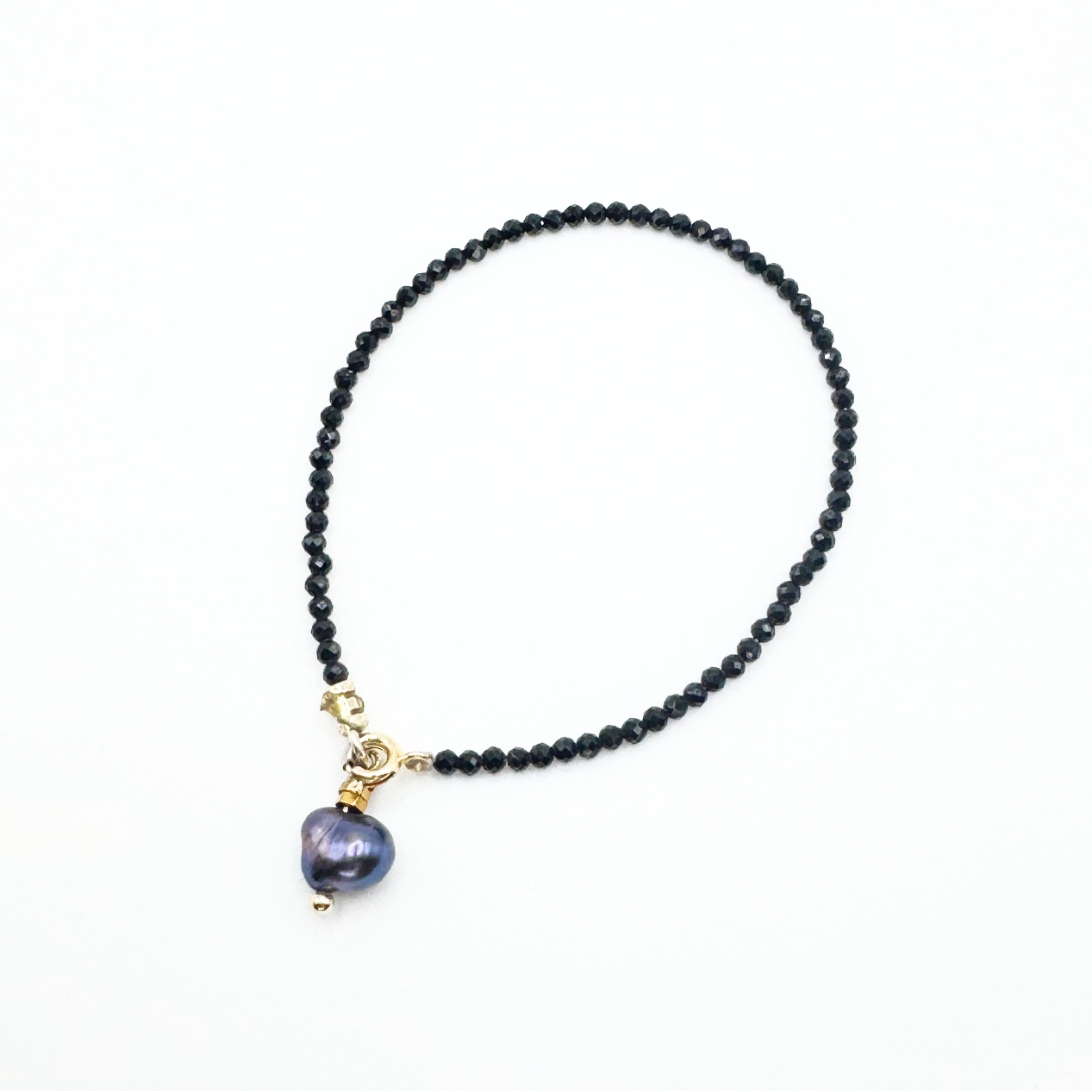 Faceted Black Onyx Gemstone Bracelet with Tahitian Peal