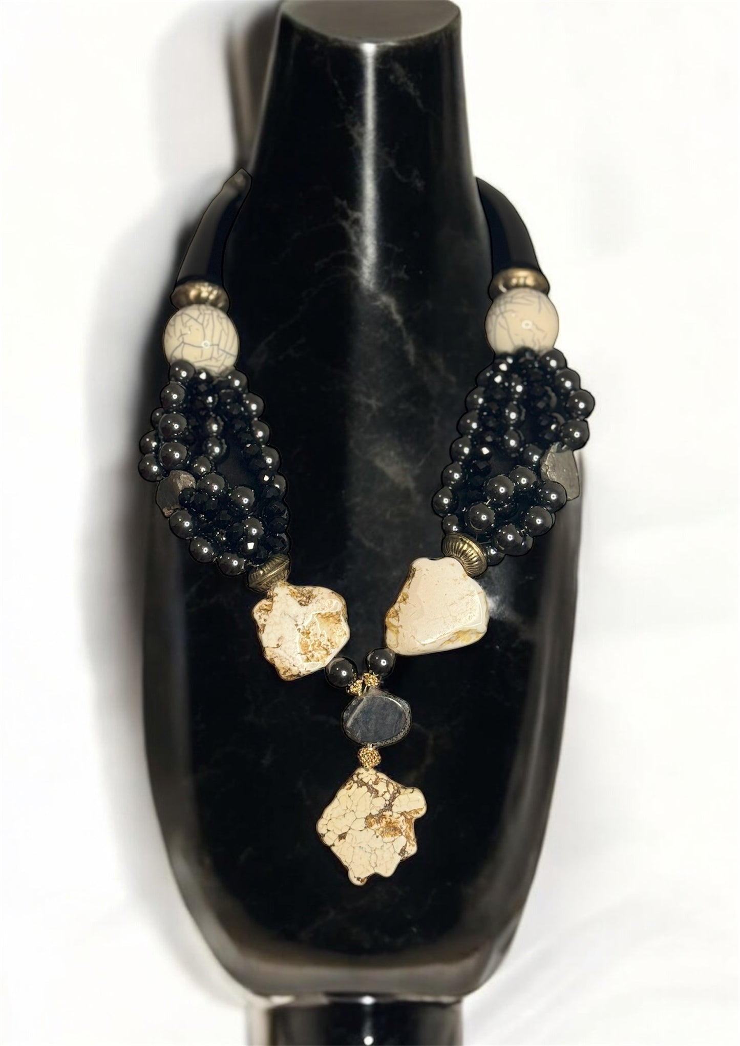 Statement necklace with hematite and howlite gemstones