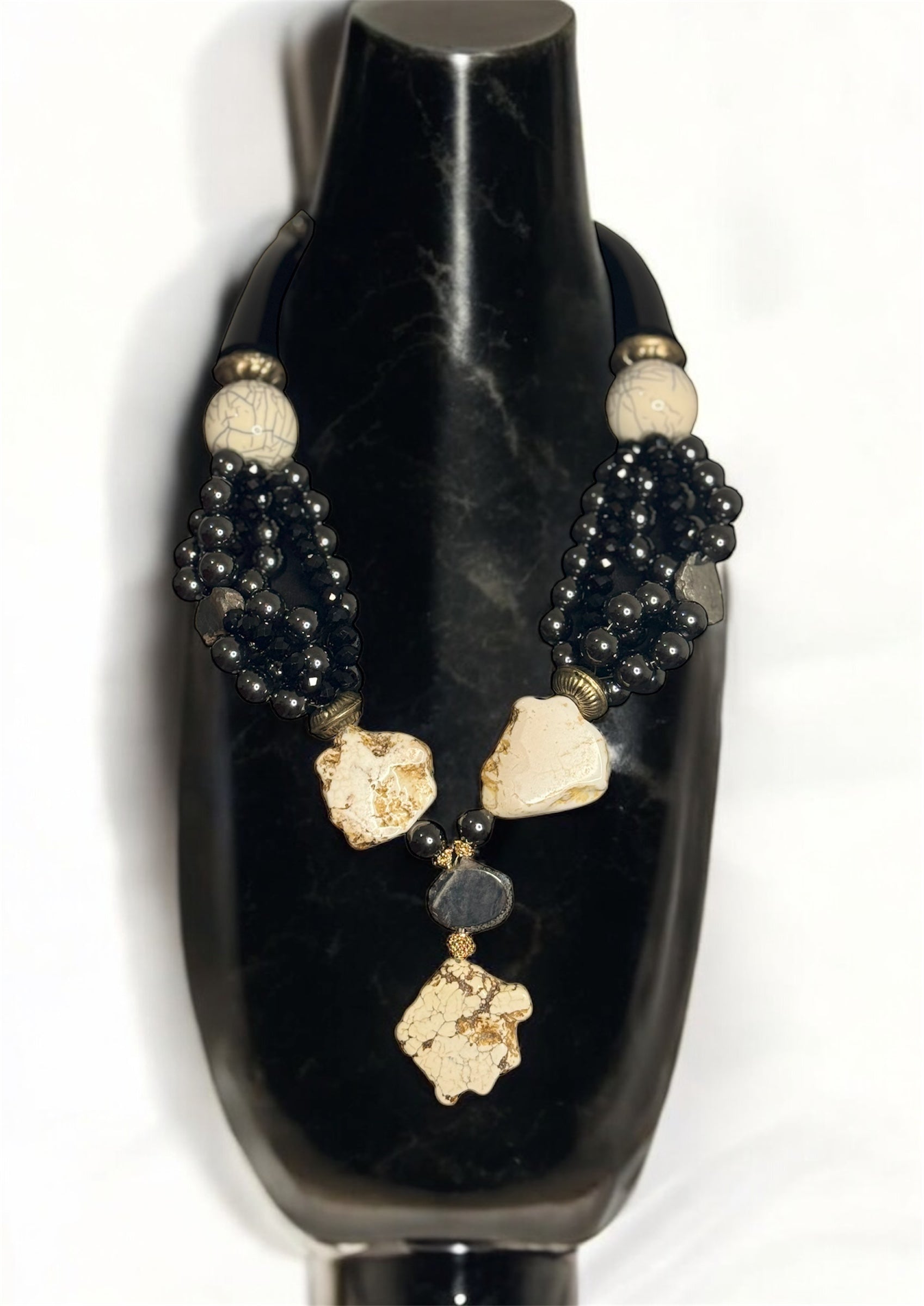 Statement necklace with hematite and howlite gemstones